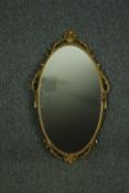 Wall mirror, mid century antique style brass framed. H.66 W.40cm.