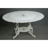 A large painted 19th century style wrought metal garden table. H.70 Dia.142cm.