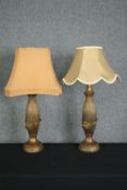 A pair of gilt table lamps with corn shaped stems. H.82cm. (each)