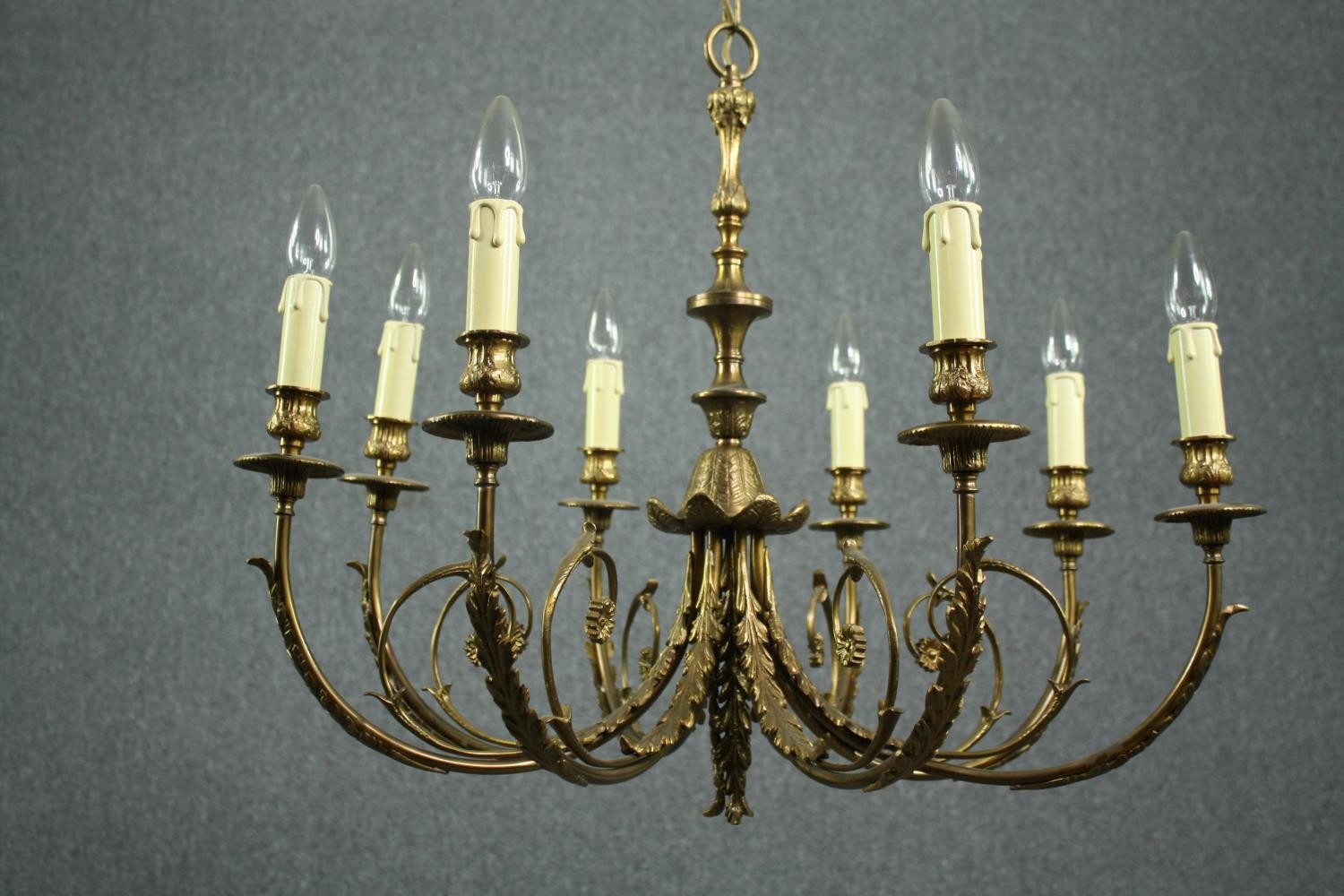 A vintage brass Continental style ten branch chandelier. H.85 Dia.70cm. - Image 3 of 6