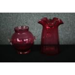 Two cranberry glass vases. H.16cm. (Largest)