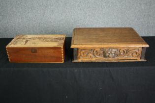 A late 19th century carved oak glove box along with a pokerwork box. H.10 W.46 D.30cm. (largest)