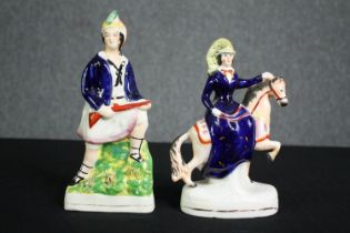 Two 19th century flatback Staffordshire figure groups, Queen Victoria on horseback and a sailor. H.