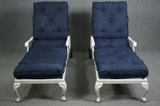 A pair of 19th century style painted garden loungers with adjustable backs. H.95 W.190 D.70cm. (