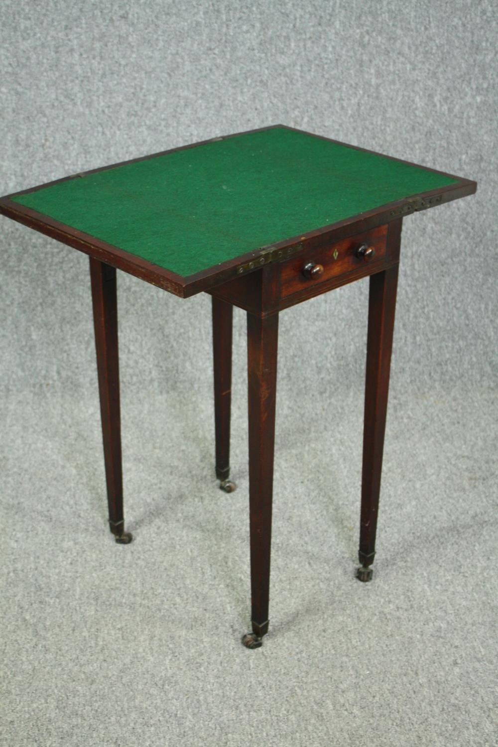 A late Georgian mahogany foldover top games table. H.75 W.63(ext) D.45cm. - Image 3 of 5