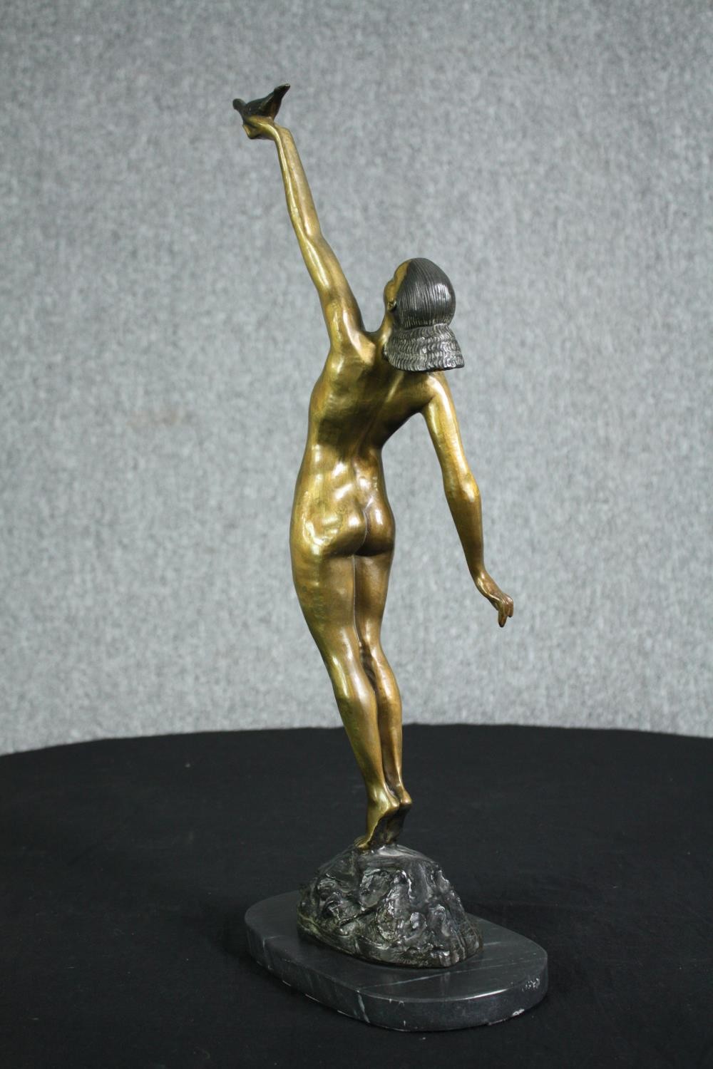 Pierre le Faguays, French (1892 - 1962), a patinated bronze figure, Girl with Dove” H.56cm. - Image 4 of 8