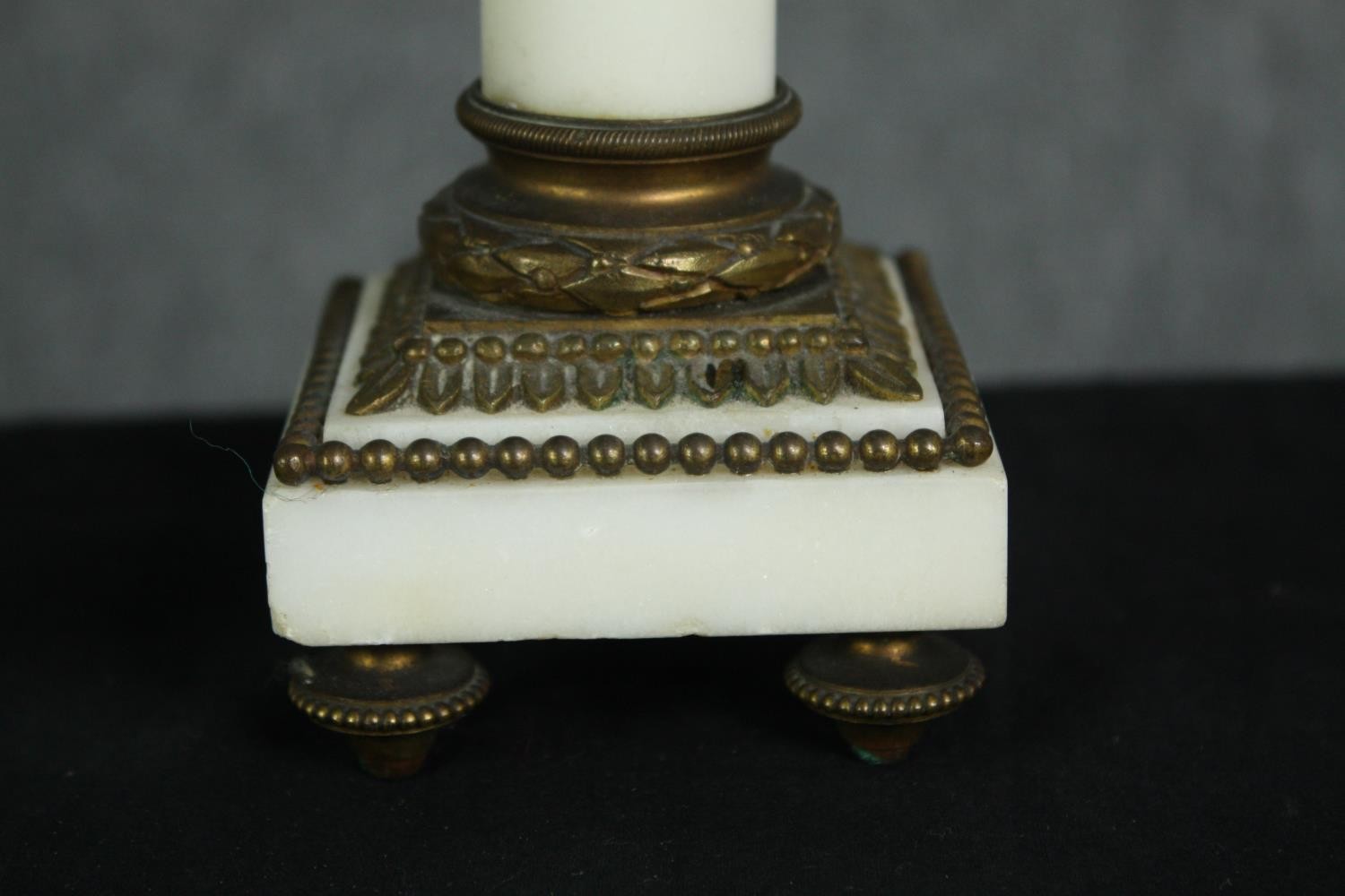 A small 19th century gilt metal and marble candelabra along with metal frame decorated with - Image 7 of 8