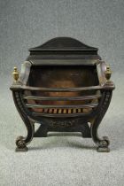 A vintage steel and cast iron fire grate in the Regency style. H.63 W.58 D.29cm.