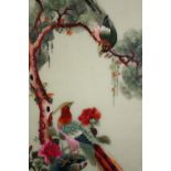 A framed and glazed Chinese silk embroidery, a pair of golden pheasants. H.74 W.34cm.