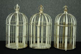 Three painted distressed metal cages. H.51cm. (each)