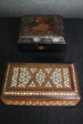 A Damascus inlaid box and a Chinese lacquered box. H.9 W.20 D.18cm. (largest)