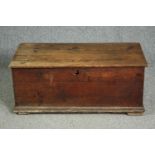 A 19th century pine trunk. H.39 W.92 D.46cm.