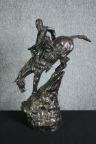 After Remington, a bronze figure group, Mountain Man and horse on a sharp descent, signed. H.68cm.