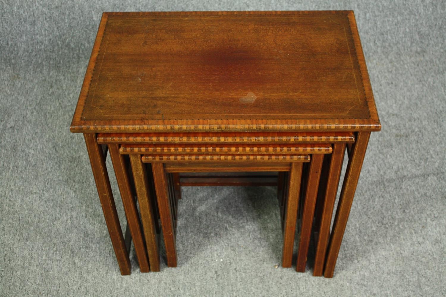 A nest of four graduating Edwardian mahogany and satinwood inlaid occasional tables. H.54 W.56 D. - Image 3 of 5