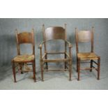 William Birch for Liberty, an Arts and Crafts oak armchair along with two side chairs.