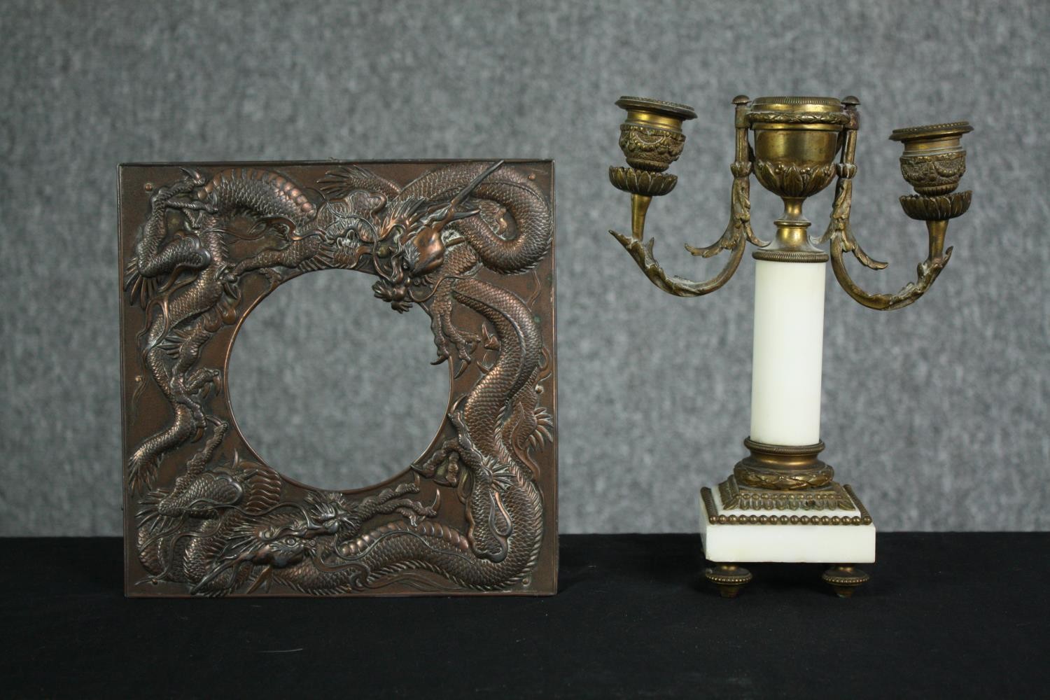 A small 19th century gilt metal and marble candelabra along with metal frame decorated with