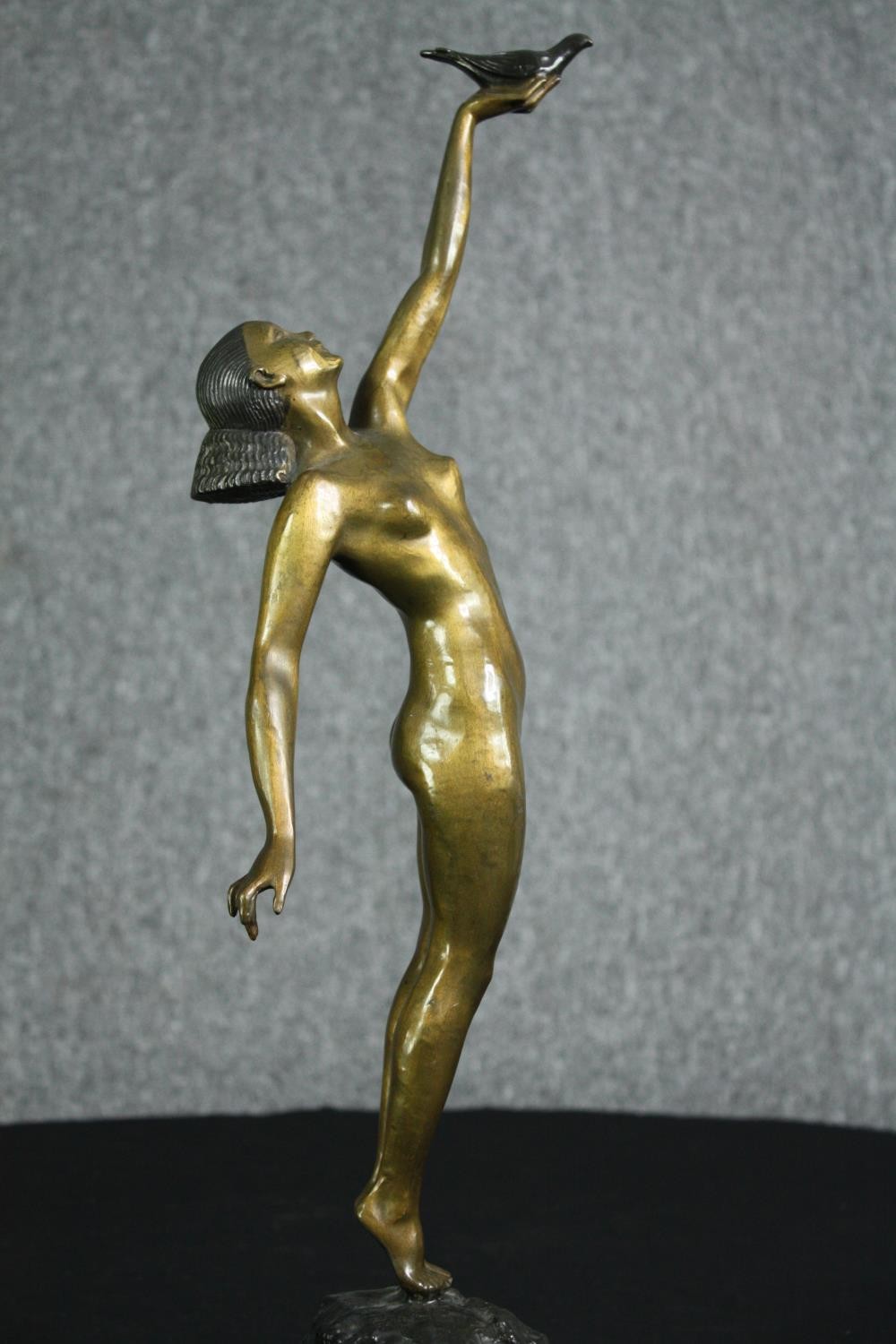 Pierre le Faguays, French (1892 - 1962), a patinated bronze figure, Girl with Dove” H.56cm. - Image 2 of 8