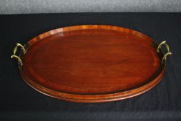 Tray, Edwardian mahogany and satinwood inlaid with twin brass carrying handles. L.60 W.39cm.