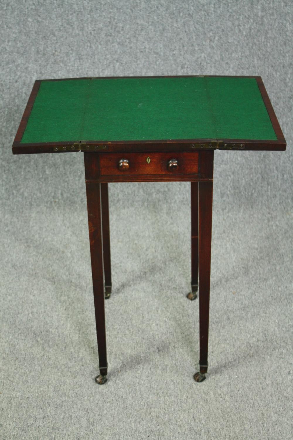 A late Georgian mahogany foldover top games table. H.75 W.63(ext) D.45cm. - Image 2 of 5