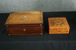 A 19th century rosewood and inlaid fitted vanity box along with an Eastern inlaid box. H.12 W.28 D.