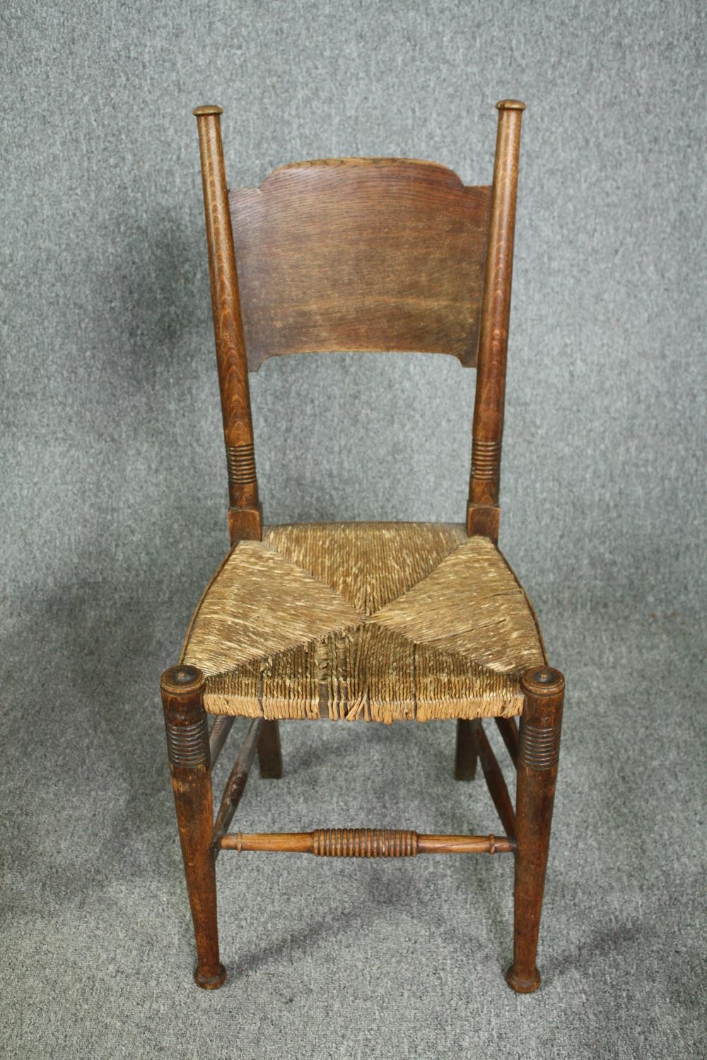 William Birch for Liberty, an Arts and Crafts oak armchair along with two side chairs. - Image 6 of 11