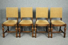 Dining chairs, a set of four mid century oak with their original upholstery material.
