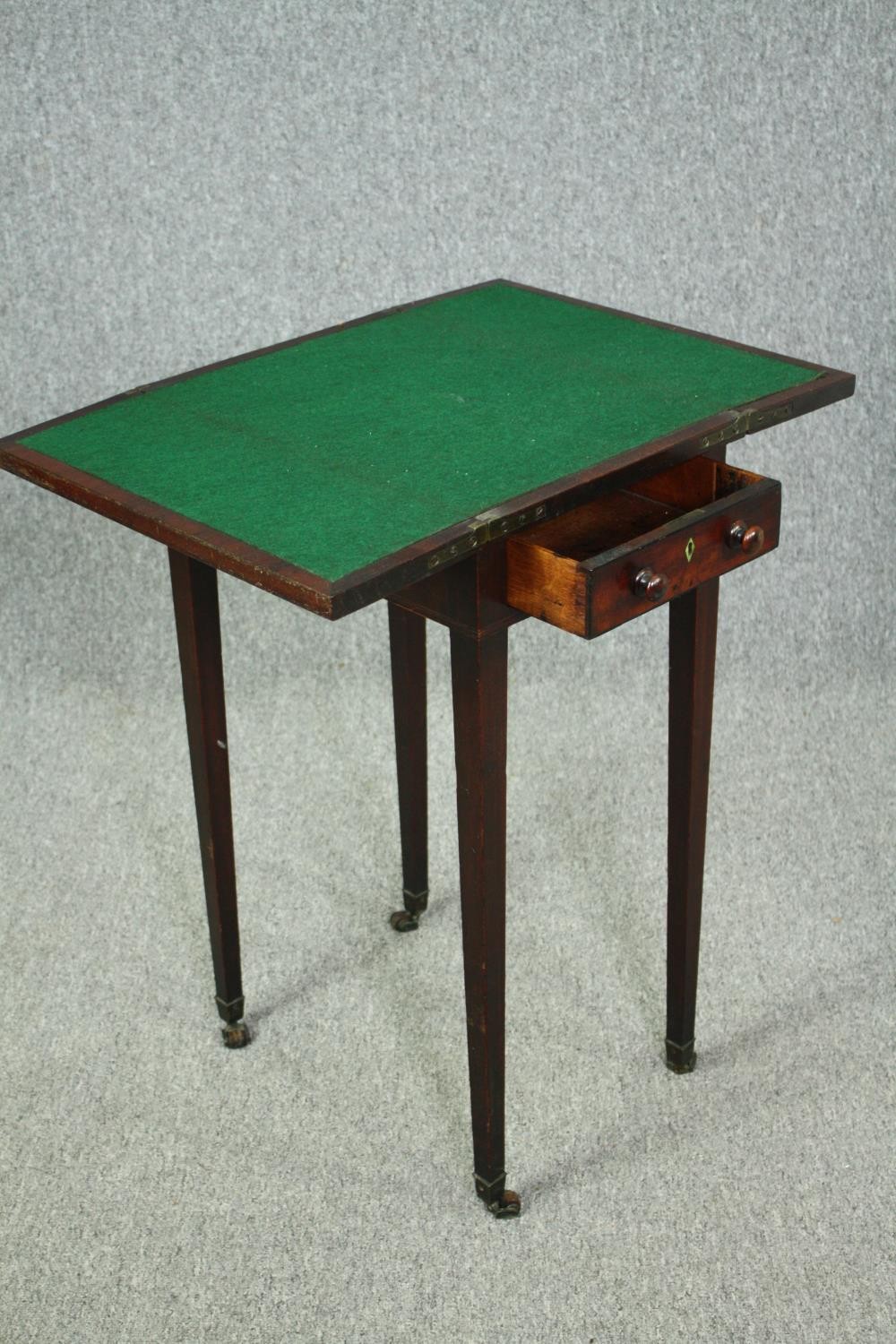 A late Georgian mahogany foldover top games table. H.75 W.63(ext) D.45cm. - Image 4 of 5