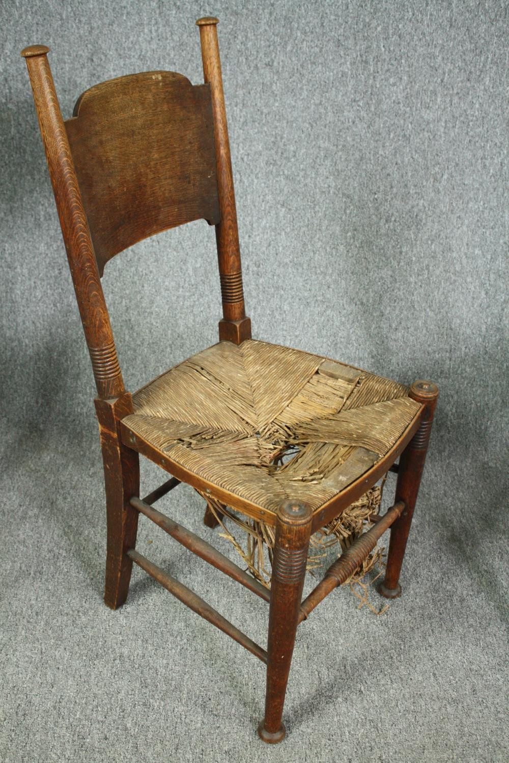 William Birch for Liberty, an Arts and Crafts oak armchair along with two side chairs. - Image 10 of 11