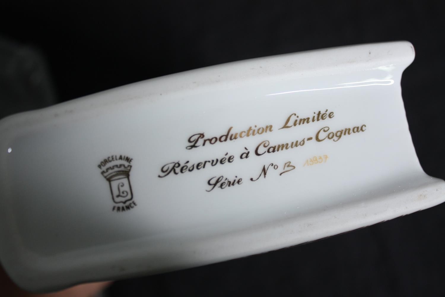 A boxed porcelain flask by Limoges containing Camus Cognac Napoleon brandy. H.25 W.16 D.8cm. - Image 8 of 8