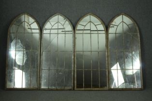 A set of four distressed metal frame Gothic arch garden windows. H.158 W.66cm. (Cracks to each).