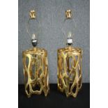 A pair of gilt metal contemporary design table lamps. H.70cm. (each)