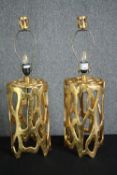 A pair of gilt metal contemporary design table lamps. H.70cm. (each)