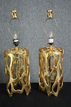 A pair of gilt metal contemporary design table lamps. H.70cm. (each)