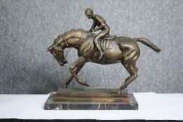 A late 20th century bronze figure group, horse and jockey. H.33 W.38 D.13cm.