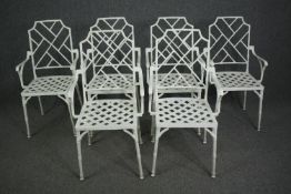 A set of six painted metal garden or conservatory armchairs in the Chinese style on faux bamboo