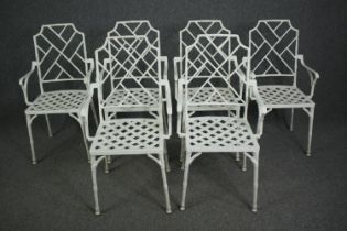 A set of six painted metal garden or conservatory armchairs in the Chinese style on faux bamboo