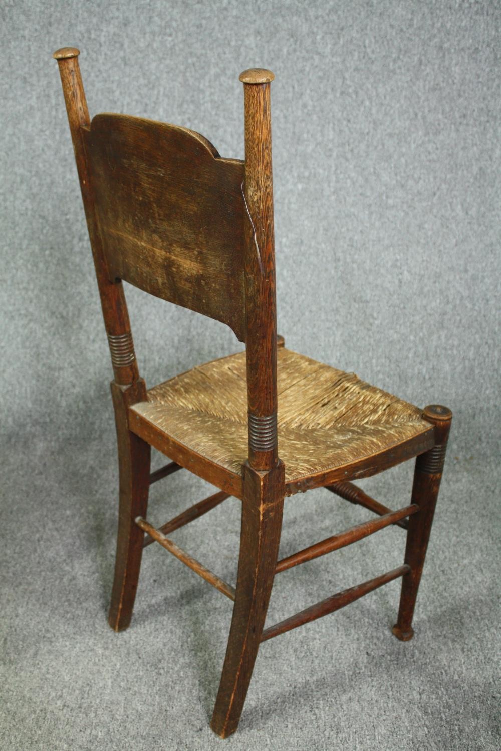 William Birch for Liberty, an Arts and Crafts oak armchair along with two side chairs. - Image 8 of 11