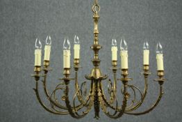 A vintage brass Continental style ten branch chandelier. H.85 Dia.70cm.