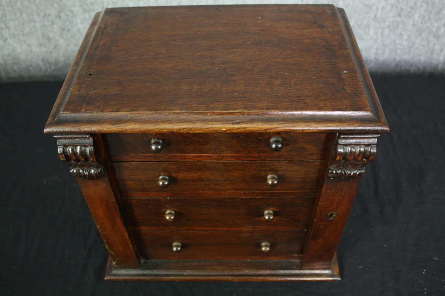 A Victorian oak miniature table top chest with carved locking stile. H.31 W.34 D.22cm. - Image 6 of 6
