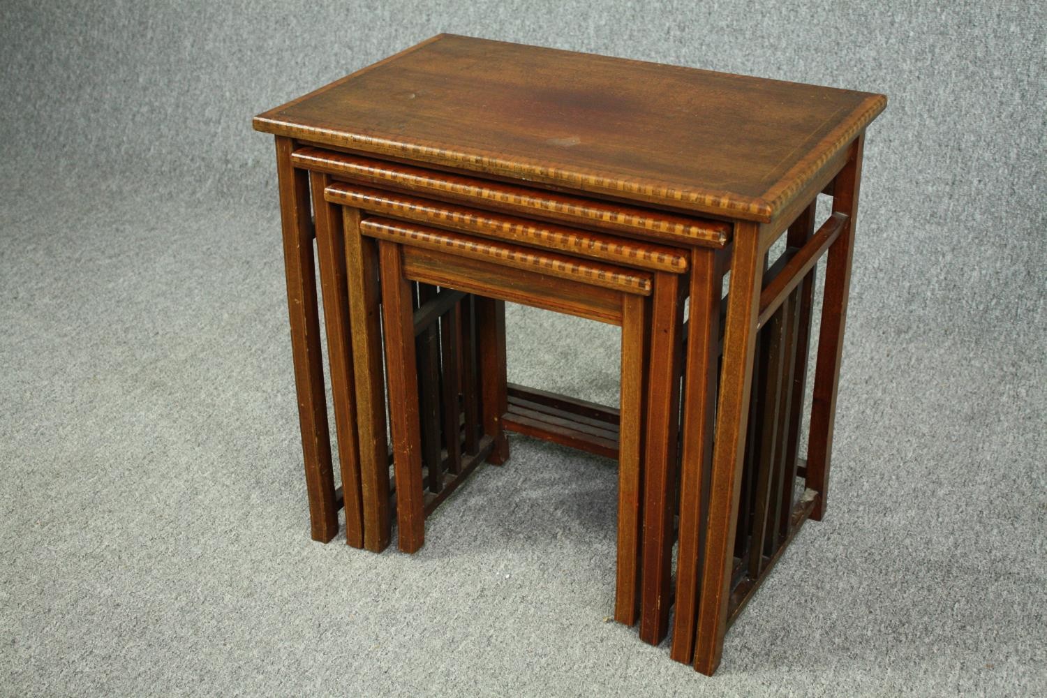 A nest of four graduating Edwardian mahogany and satinwood inlaid occasional tables. H.54 W.56 D. - Image 5 of 5