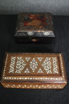 A Damascus inlaid box and a Chinese lacquered box. H.9 W.20 D.18cm. (largest)