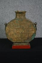 A Chinese gilt bronze archaic style Hu wine vessel converted for electricity. H.50 W.43 D.15cm.