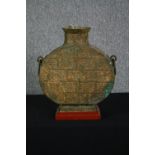 A Chinese gilt bronze archaic style Hu wine vessel converted for electricity. H.50 W.43 D.15cm.