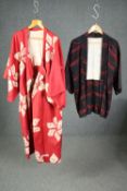 Two early 20th century silk Japanese kimonos, red Michiyuki and a black Haori. one with tie dye