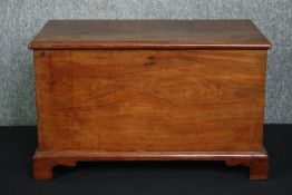 A 19th century elm trunk of small size. H.37 W.60 D.33cm.