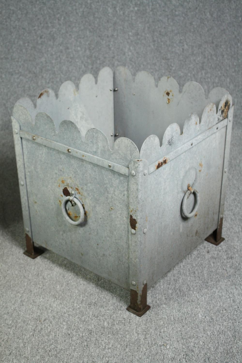 A large pair of early 20th century galvanised metal and painted garden planters. H.62 W.54 D. - Image 4 of 5