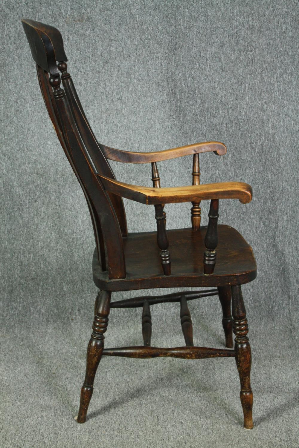 A 19th century beech and elm stick back kitchen armchair. H.114cm. - Image 3 of 5