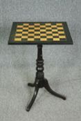 Chess table, 19th century ebonised with ebony and maple inlaid top. H.69 W.50 D.50cm.