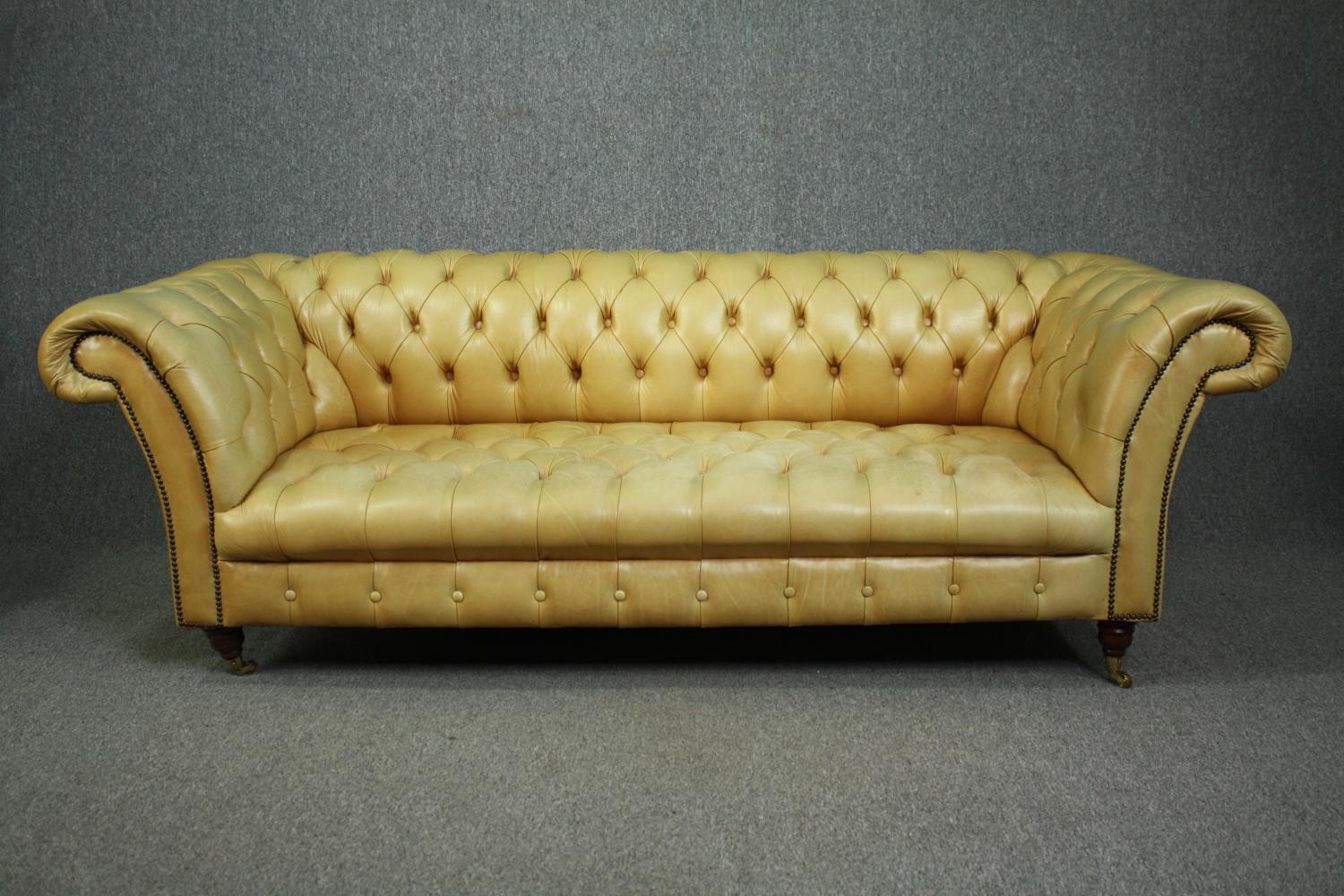 Chesterfield sofa, Victorian style in deep buttoned and studded leather upholstery raised on - Image 4 of 8