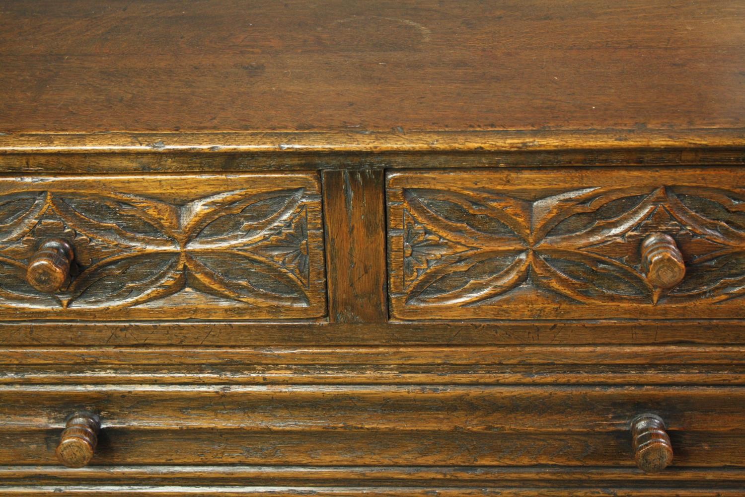 A mid century Ipswich oak side cabinet in the Jacobean style with carved flowerhead and linen fold - Image 6 of 9